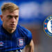 BREAKING NEWS: Chelsea Target Ipswich Striker Liam Delap  Chelsea are reportedly setting their sights on Ipswich Town striker Liam Delap as their latest forward target. According to Sky Sports, Delap has emerged as a key candidate after rating exceptionally high on the club’s advanced transfer metrics.  This comes after the Blues missed out on Napoli’s star forward Victor Osimhen, a top priority for many elite clubs, and chose to cool their interest in Newcastle United’s Alexander Isak due to undisclosed reasons.  Liam Delap, 21, has been in scintillating form for Ipswich this season, with his dynamic style of play, work rate, and clinical finishing drawing attention from some of the Premier League’s biggest clubs. Chelsea’s recruitment team, known for their data-driven approach to transfers, has identified Delap as a player with significant potential to fit into manager Mauricio Pochettino’s system.  While Chelsea have been actively rebuilding their squad with a focus on younger talents, the move for Delap would align with the club’s long-term vision of nurturing and integrating emerging stars into their first team. However, with Ipswich currently enjoying a strong campaign in the Championship, they are likely to demand a substantial fee for their prized asset.  Chelsea are expected to hold further talks with Ipswich in the coming weeks as the January transfer window approaches. Fans will be eager to see if Delap, the son of former Premier League player Rory Delap, can follow in the footsteps of other young strikers who’ve risen through the ranks to make a significant impact at Stamford Bridge.  Stay tuned for updates as this story develops.